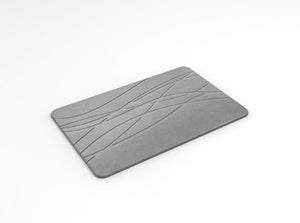 Tapete tipo piedra absorbente